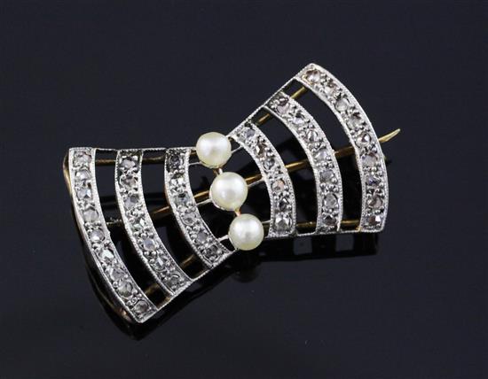 An early 20th century French Belle Epoque 18ct gold, rose cut diamond and seed pearl set brooch, 1in.